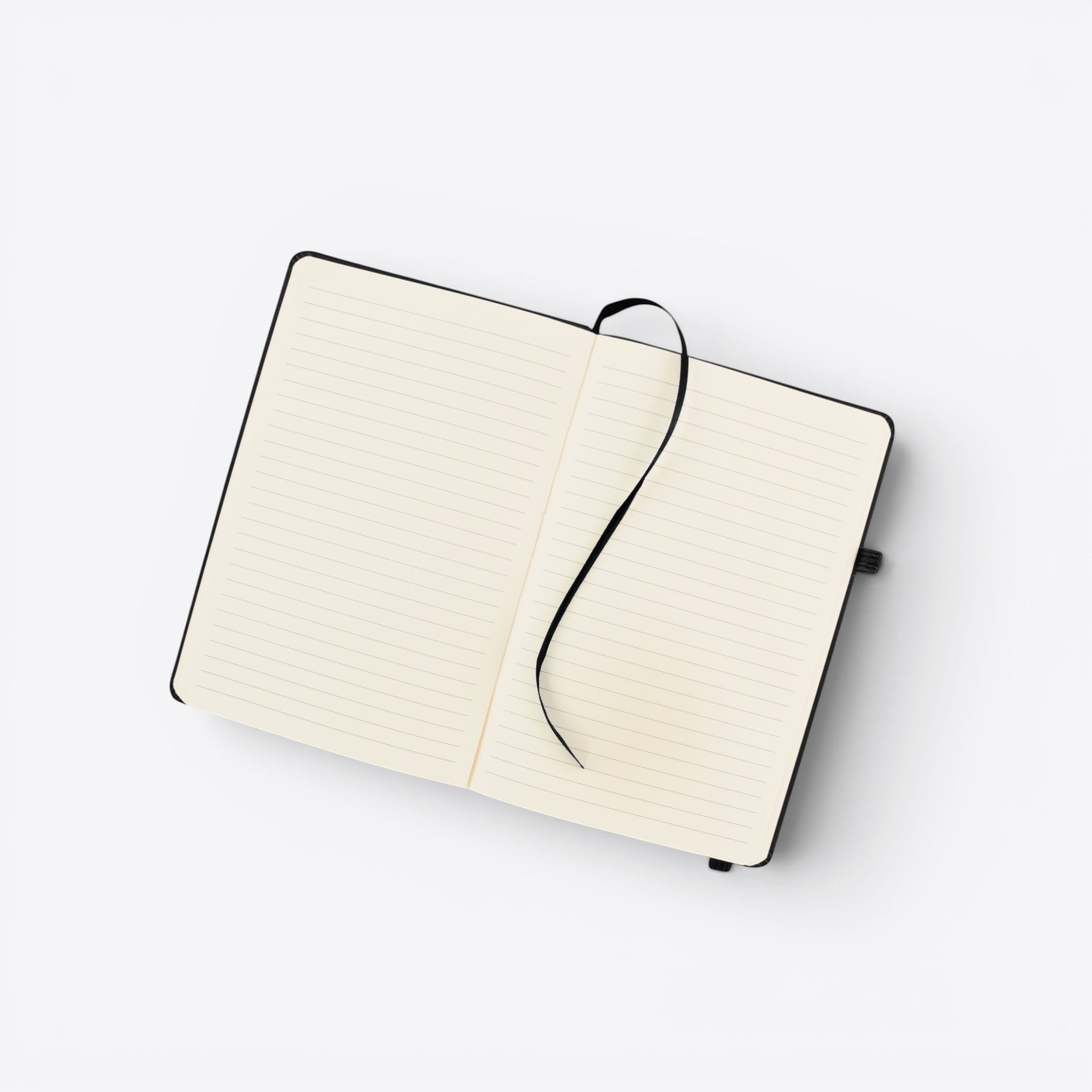 TODAY MERCH black notebook with lined cream pages and a black ribbon bookmark. Features an integrated pen holder.