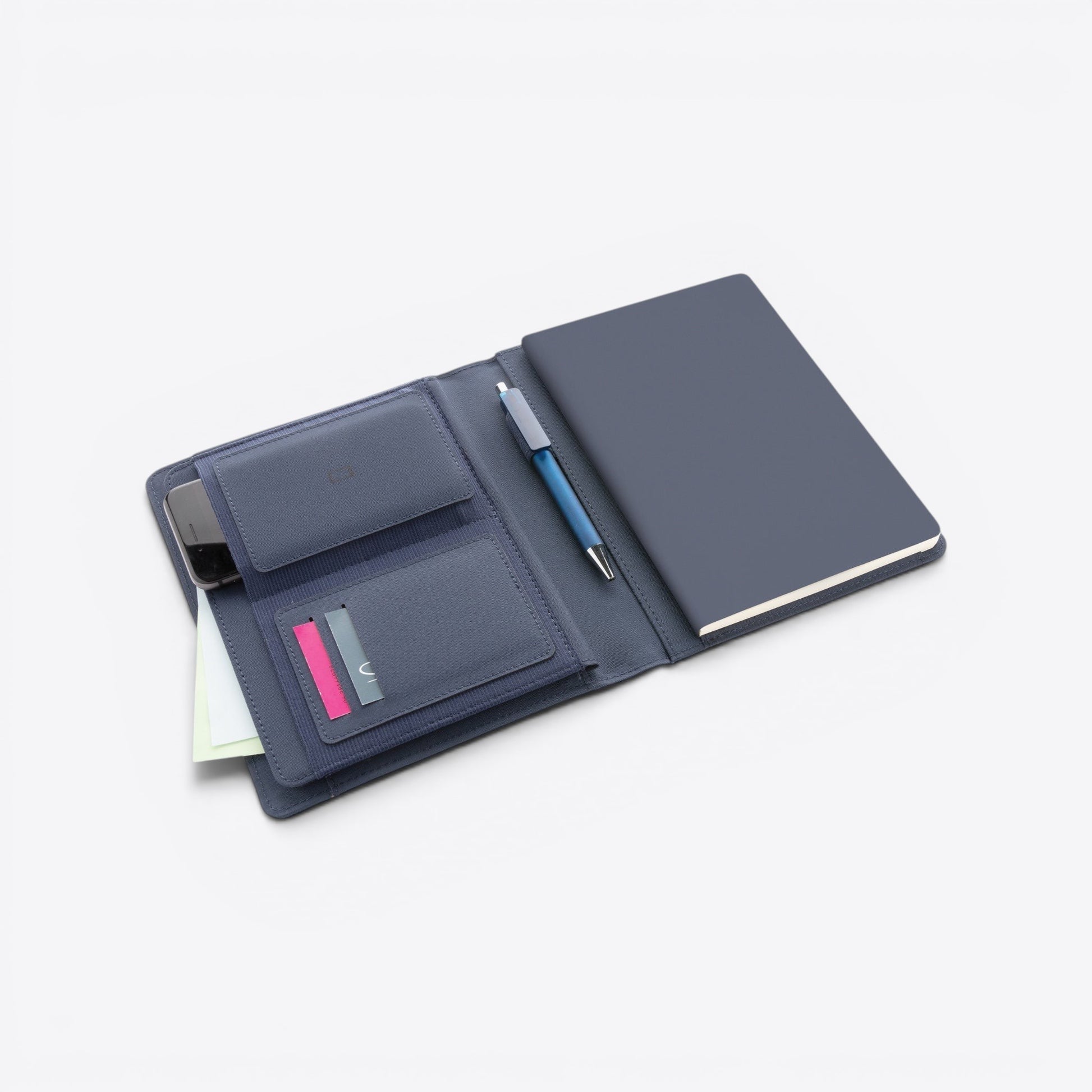 TODAY MERCH navy blue leather portfolio organizer with notebook, pen, phone, and card slots.