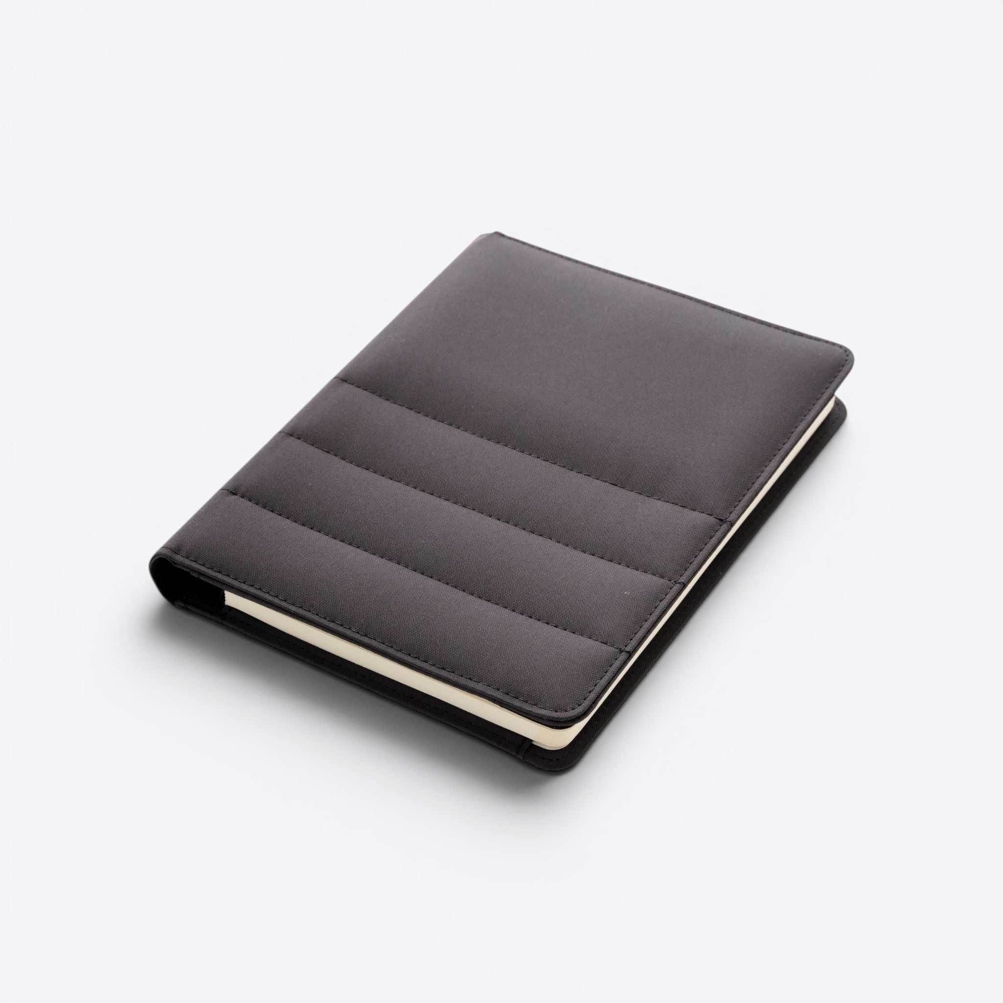 TODAY MERCH dark grey quilted document holder with stitched lines and a cream-colored edge.
