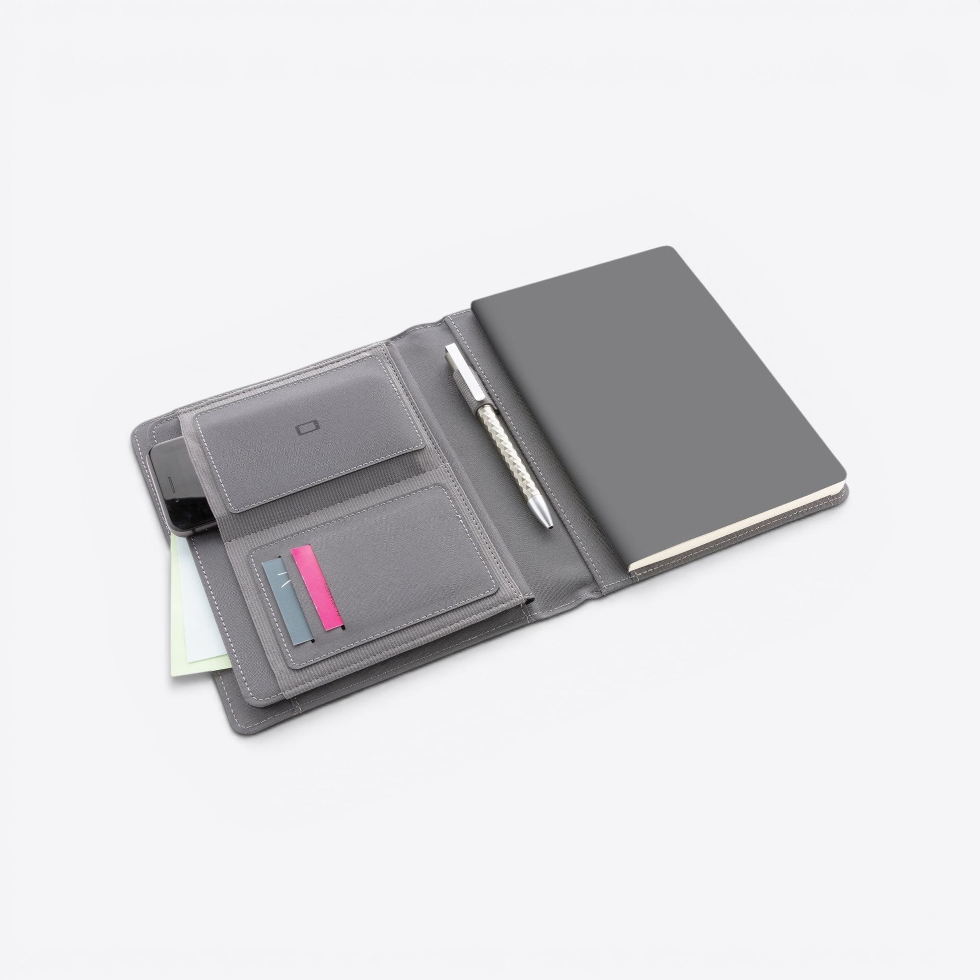 TODAY MERCH grey quilted document holder with pen slots, card holders, and a notebook. Includes a phone and sticky notes.