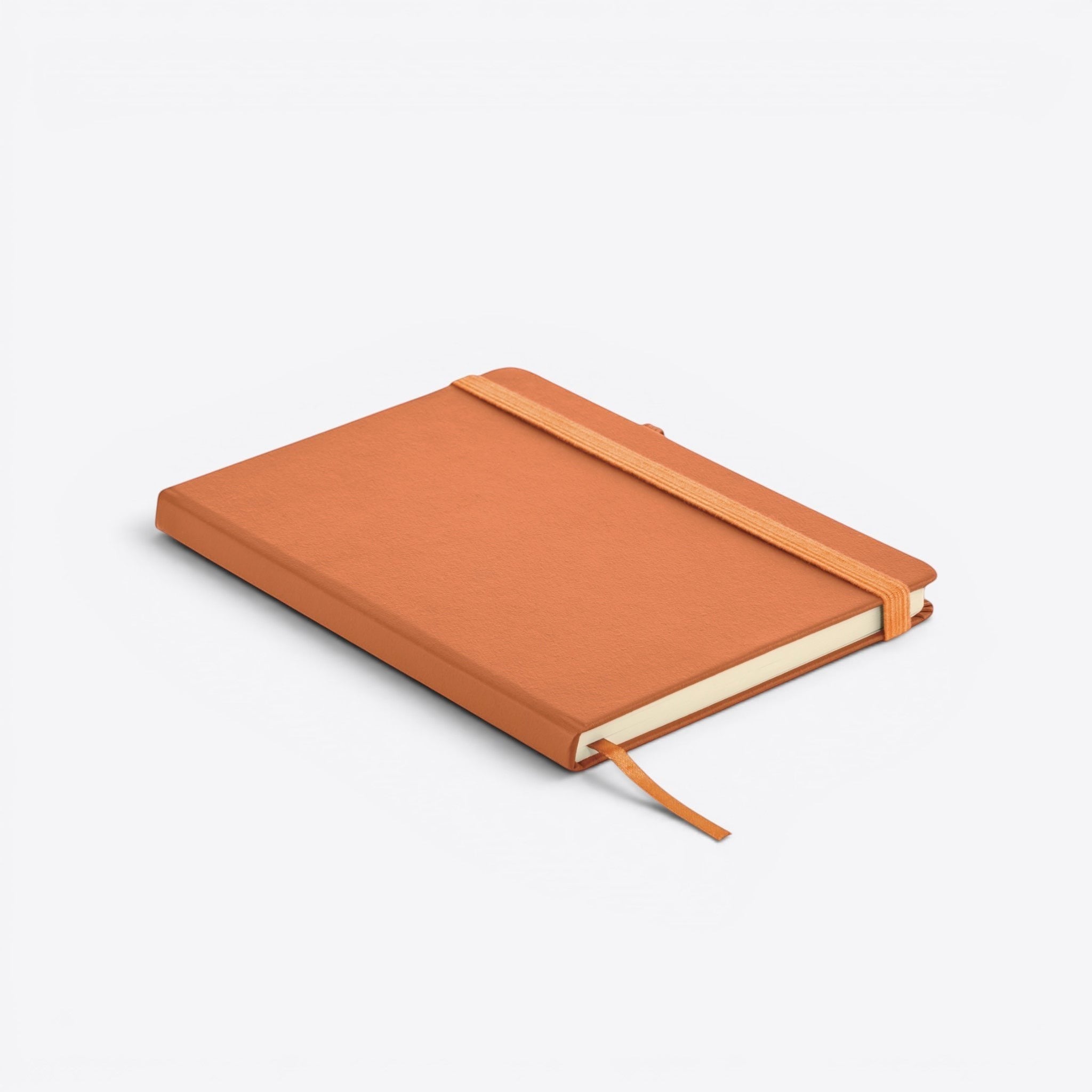 TODAY MERCH orange notebook with elastic closure and pen loop, ideal for professionals on the go.