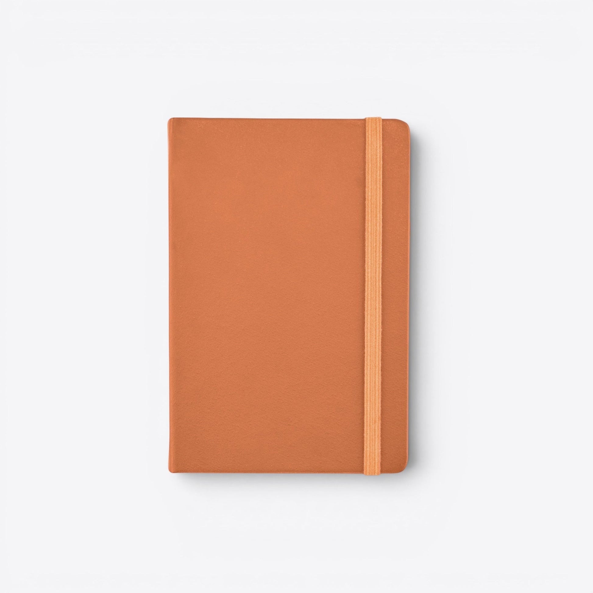 TODAY MERCH orange notebook with integrated pen holder and elastic closure, perfect for professionals on the go.