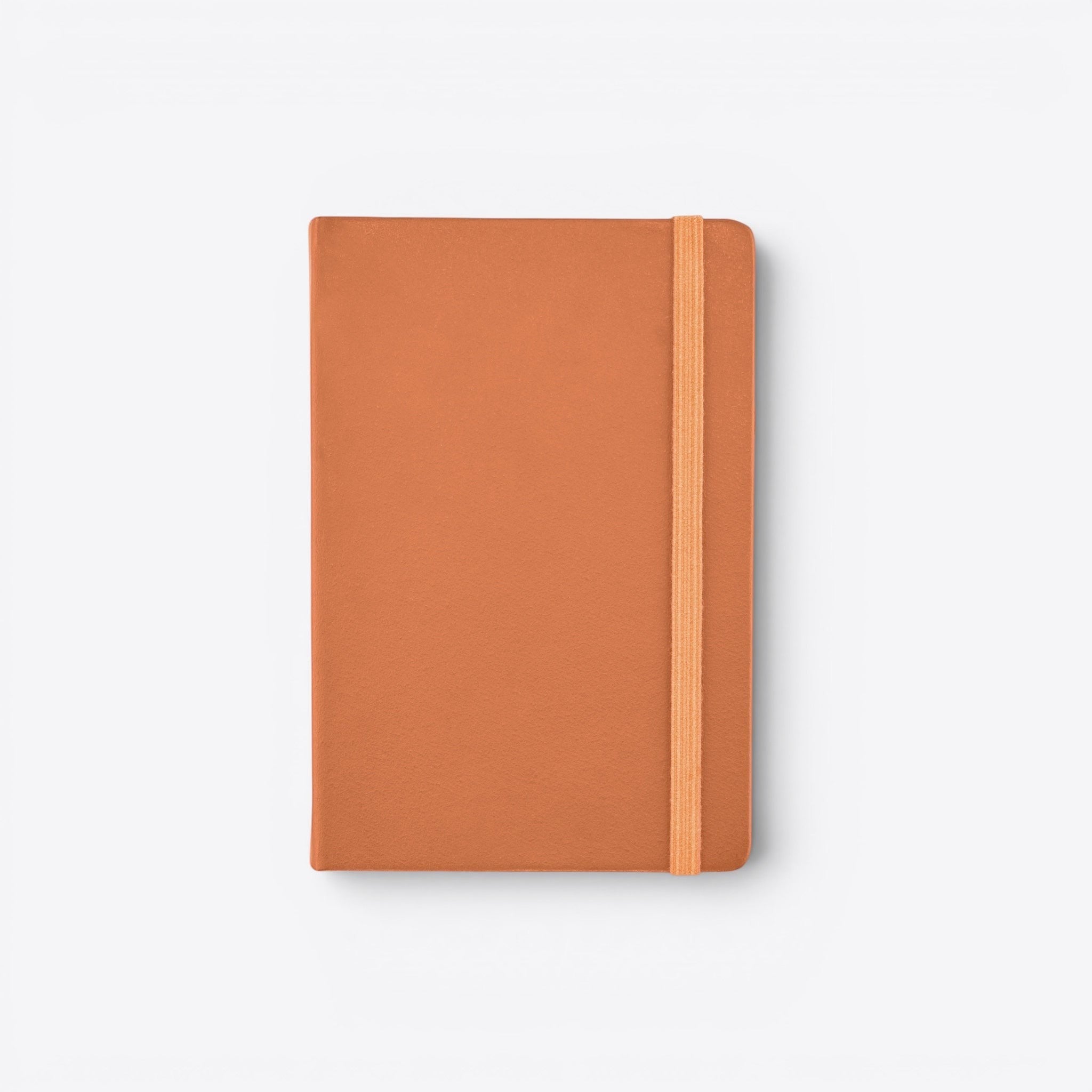 TODAY MERCH orange notebook with integrated pen holder and elastic closure, perfect for professionals on the go.