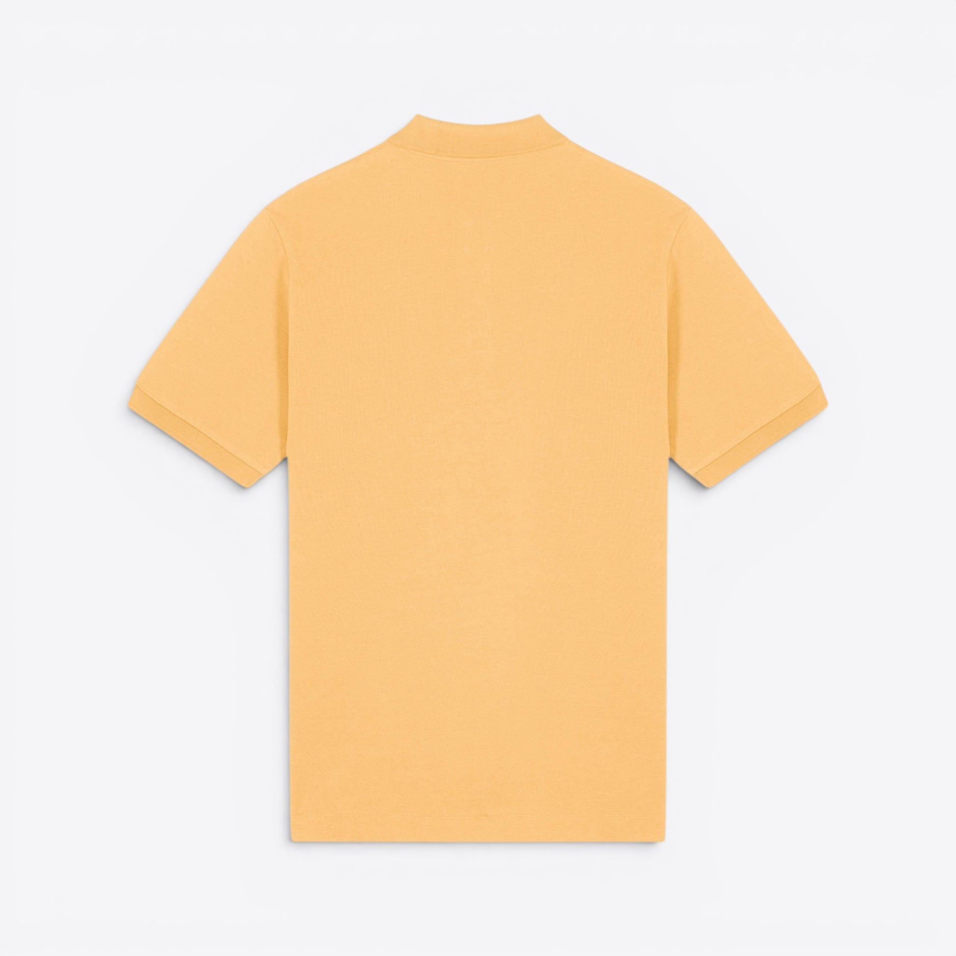 TODAY MERCH unisex premium short-sleeve polo shirt in light orange organic cotton pique.