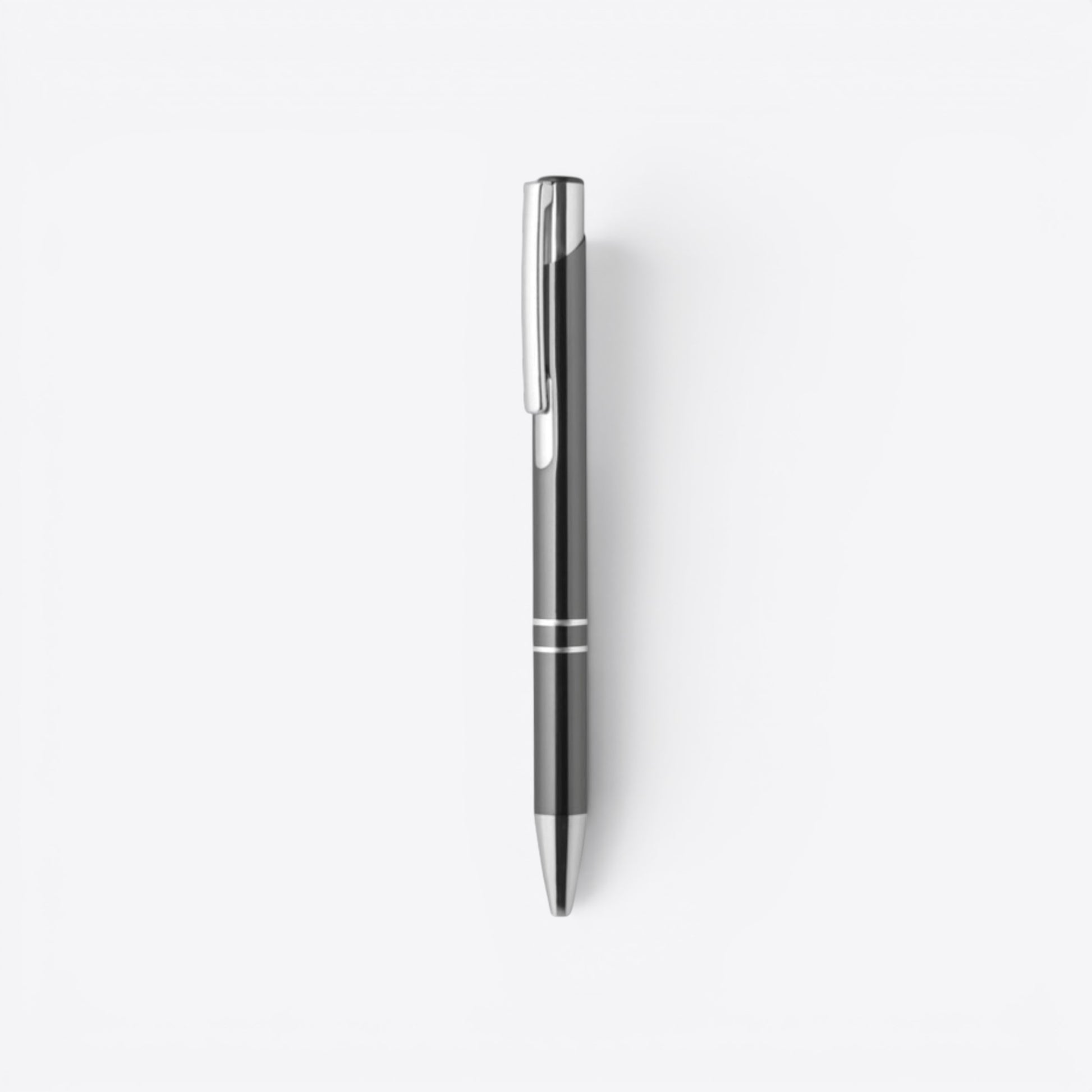 TODAY MERCH premium ballpoint pen in dark grey with silver clip and two silver bands near the tip.