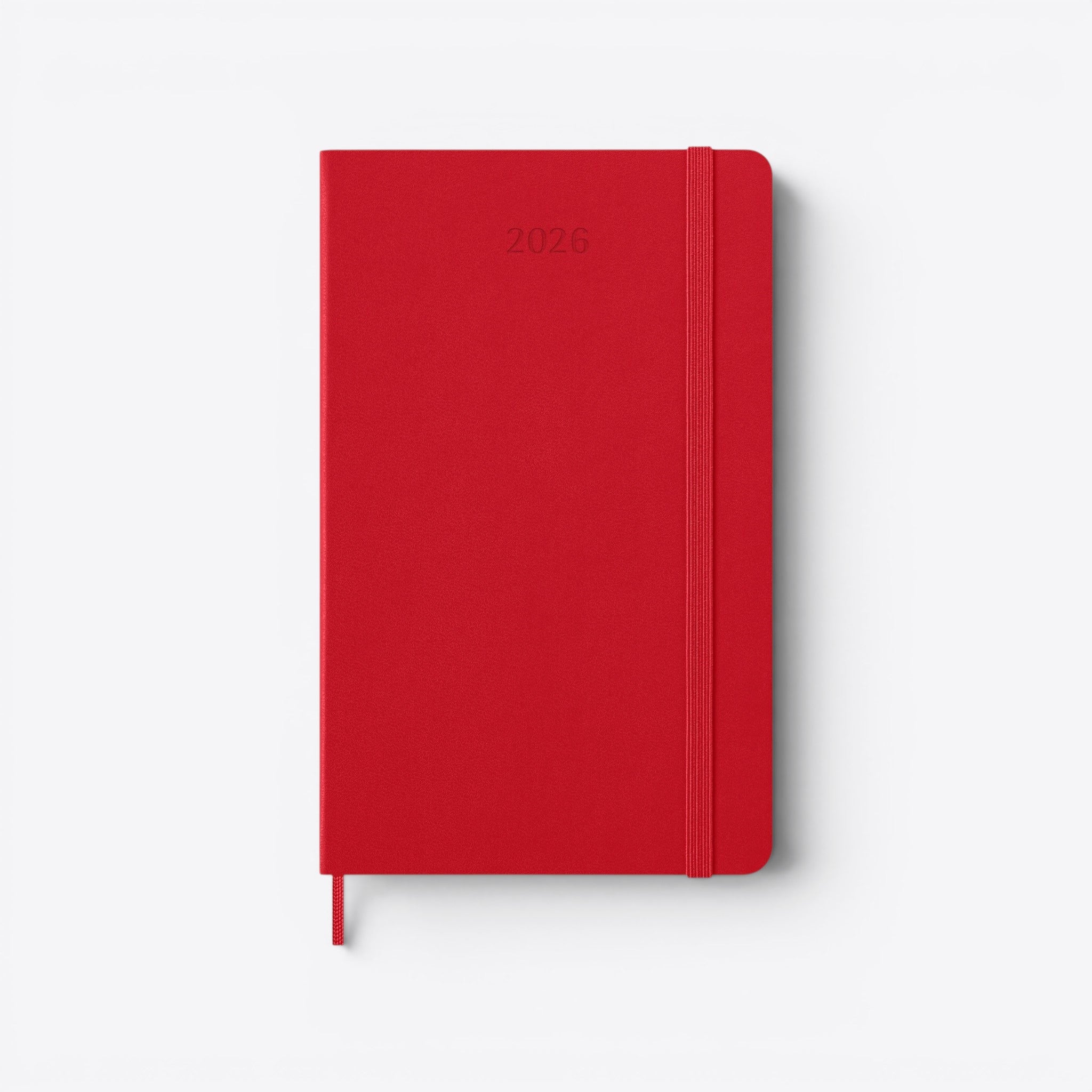 TODAY MERCH red Moleskine planner for 2026 with elastic closure and bookmark ribbon.