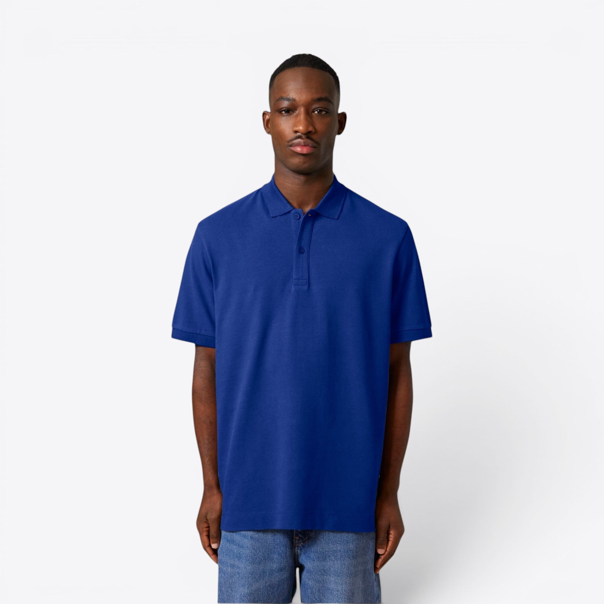 TODAY MERCH unisex premium short-sleeve polo shirt in royal blue organic cotton pique. Structured fit, ideal for corporate wear.